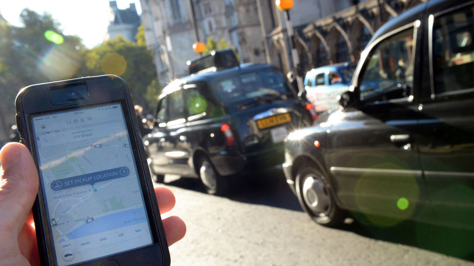 Uber and London's black cab drivers have been at loggerheads. Image Anthony Devlin  PA Wire  Associated Press