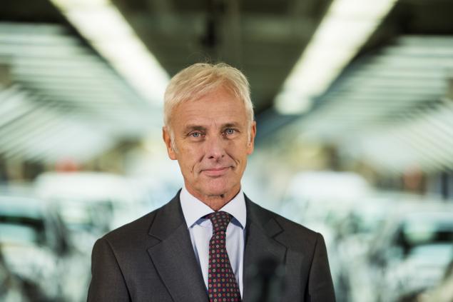 Matthias Mueller CEO of German car maker Volkswagen poses before addressing journalists at an assembly line of the VW plant in Wolfsburg central Germany