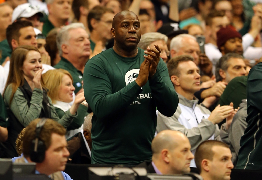 Michigan fans give Magic Johnson statue at MSU's Breslin Center a maize makeover