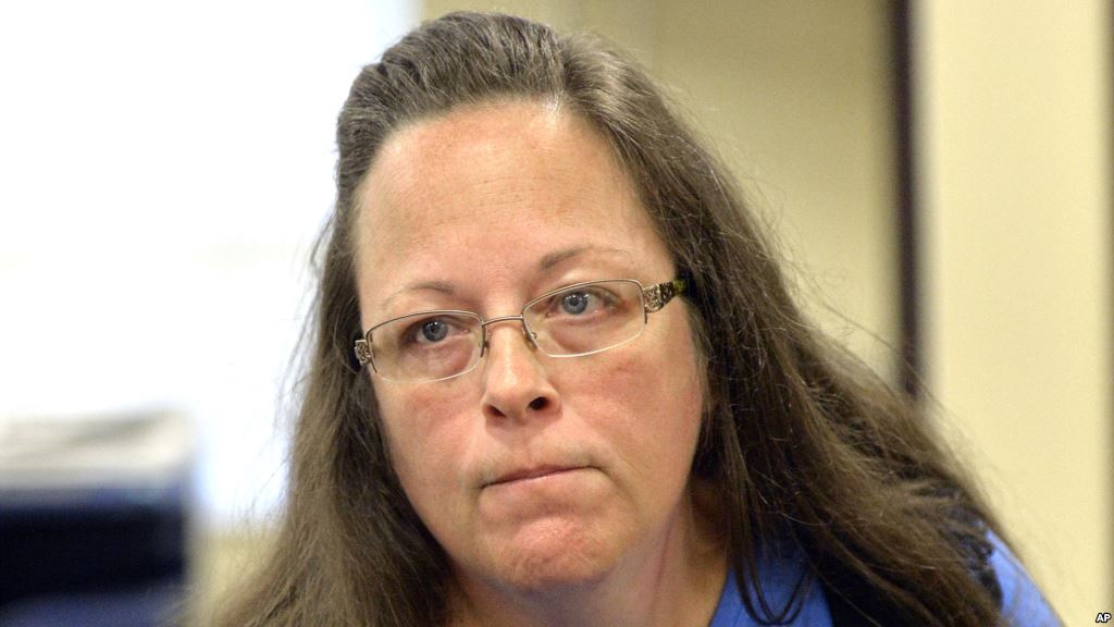 Rowan County Clerk Kim Davis listens to a customer following her office's refusal to issue marriage licenses at the Rowan County Courthouse in Morehead Ky. Sept. 1 2015