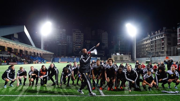 Vincent Kompany did not play in Andorra but led the celebrations as Belgium qualified for Euro 2016