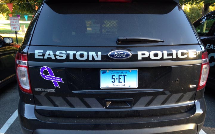 Police Chief Tim Shaw. has placed large purple ribbons on all of the Easton Police Department cruisers for the month of October to show support for Domestic Violence Prevention Month