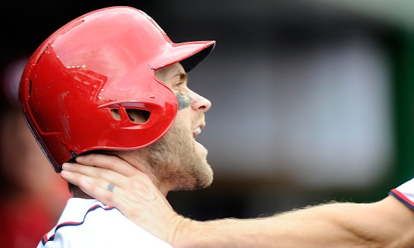 WASHINGTON DC- SEPTEMBER 27 Bryce Harper #34 of the Washington Nationals is grabbed by Jonathan Papelbon #58 in the eighth inning against the Philadelphia Phillies at Nationals Park