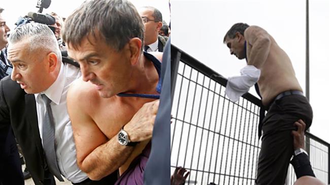 Air France's human resources manager Xavier Broseta was forced to jump over a fence to escape angry workers who stormed the airline's offices in Roissy-en France