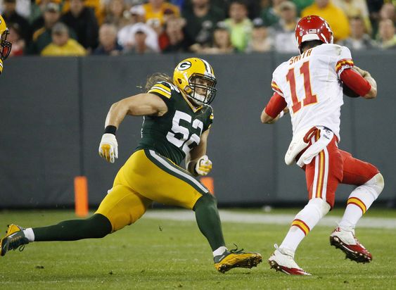 Clay Matthews tries to catch Kansas City Chiefs Alex Smith during the second half of an NFL football game Monday Sept. 28 2015 in Green Bay Wis