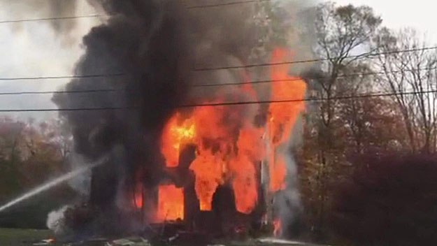 Explosion levels Taunton home; woman inside escapes