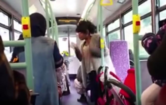 Racist woman filmed calling Muslim women 'ISIS b******&#039 on London bus