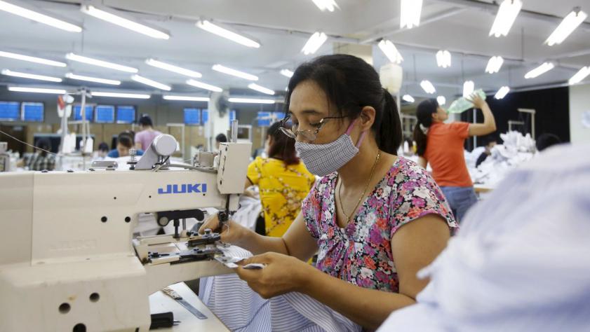 Women work at a garment factory at Sai Dong in Vietnam