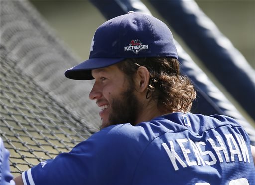 Los Angeles Dodgers pitcher Clayton Kershaw looks on during practice for the upcoming NLDS playoff baseball series against the New York Mets Tuesday Oct. 6 2015 in Los Angeles. Their NLDS best of five playoff series begins Friday Oct. 9 at Dodger St