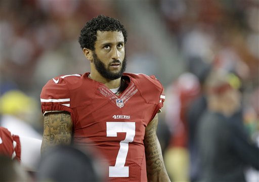 San Francisco 49ers quarterback Colin Kaepernick stands on the sideline during the second half of an NFL football game against the Seattle Seahawks in Santa Clara Calif. Thursday Oct. 22 2015