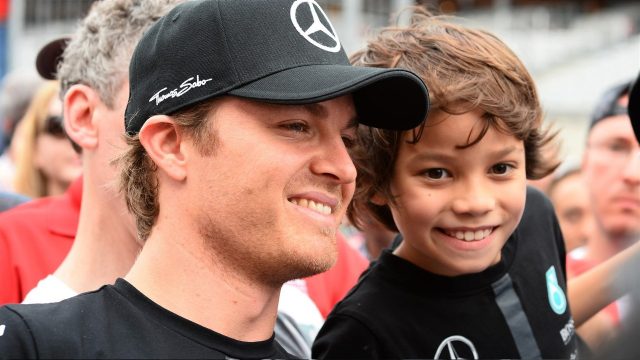 Nico Rosberg Mercedes AMG F1 and young fan at Formula One World Championship Rd16 United States Grand Prix Preparations Austin Texas USA Thursday 22 October 2015. &copy Sutton Motorsport Images