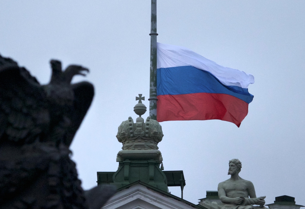 A Russian national flag flies at half staff at Dvortsovaya Square