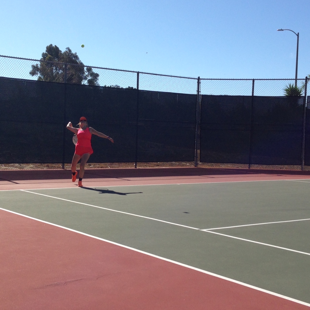 A good serve is hard to read as to direction and spin