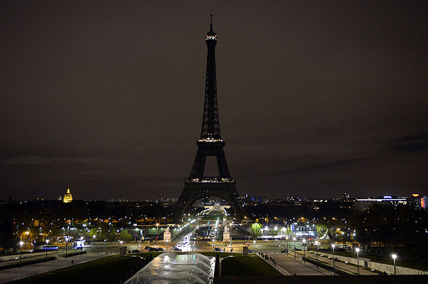 14 2015 shows the Eiffel Tower with its lights turned off following the deadly attacks in Paris