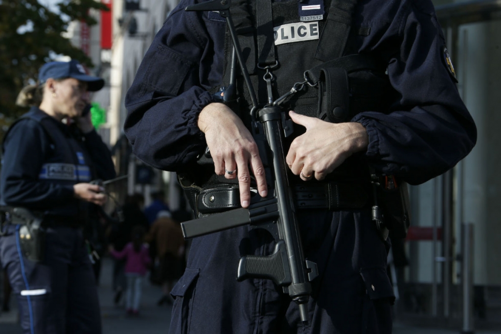 A police officer stands guard in Paris following the attacks on Friday night