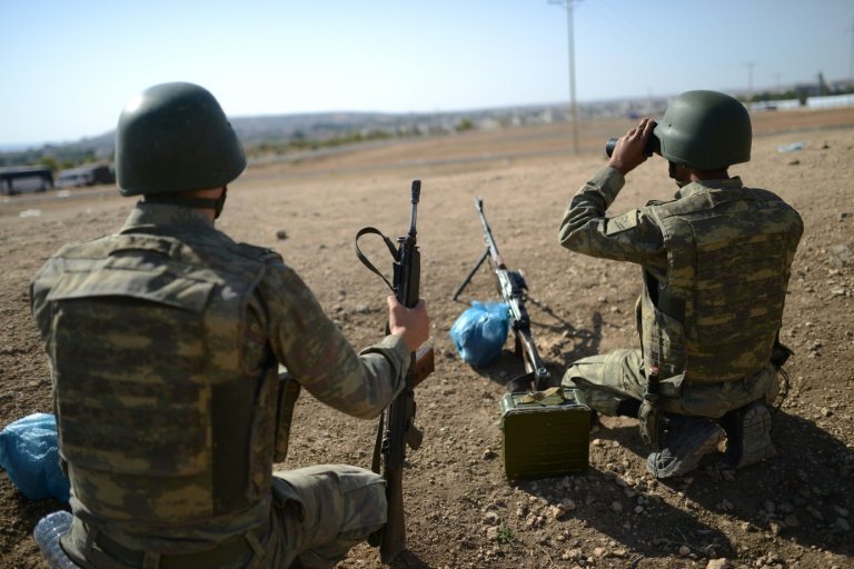 AFP  File Bulent Kilic Turkish soldiers standing guard on the Syrian border where a Russian military plane was shot down on Tuesday