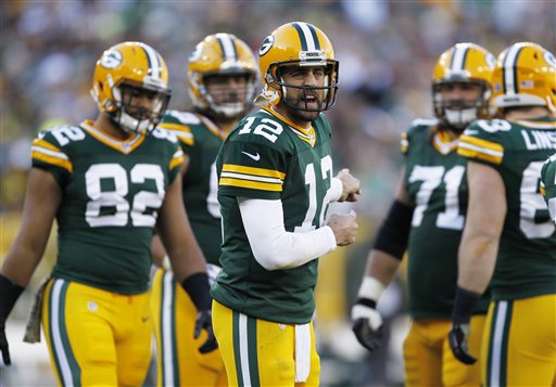 Green Bay Packers&#039 Aaron Rodgers yells to his teammates during the second half of an NFL football game against the Detroit Lions Sunday Nov. 15 2015 in Green Bay Wis