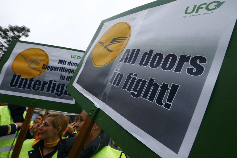 Activists of cabin crew union UFO stage a protest in Frankfurt airport Germany. – Reuters pic