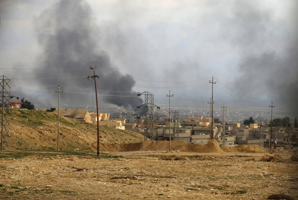 Kurdish fighters launch offensive to retake strategic Iraqi town of Sinjar 