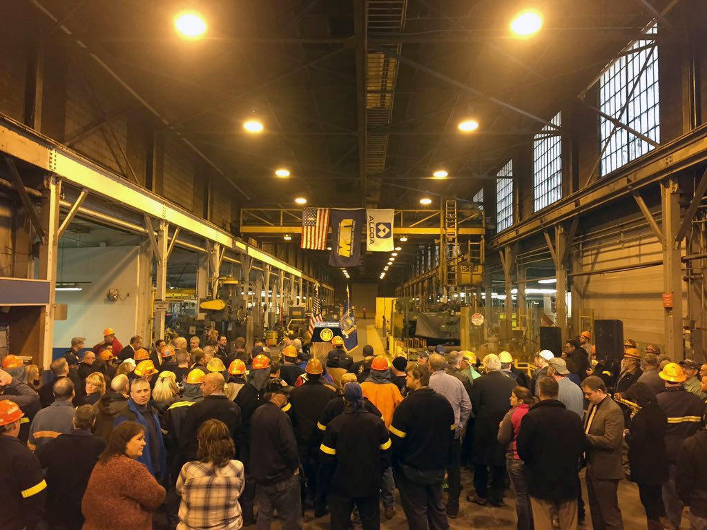 Alcoa workers wait for an announcement from Gov. Cuomo today