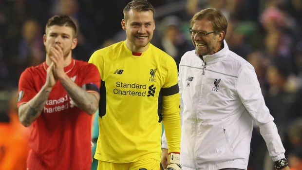 All smiles Jurgen Klopp jokes with Simon Mignolet after the final whistle