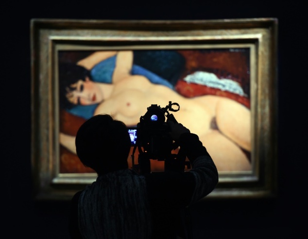 Amedeo Modigliani's'Nu couche on display at a press preview at Christie's New York