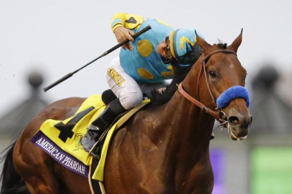 American Pharoah with Victor Espinoza up wins the