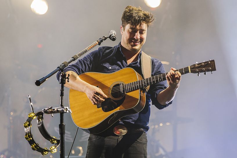 LEEDS ENGLAND- AUGUST 29 Marcus Mumford of Mumford and Sons performs on the main stage at Leeds Festival at Bramham Park