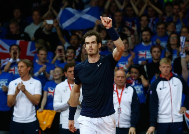 Andy Murray celebrates after winning his singles rubber against Ruben Bemelmans