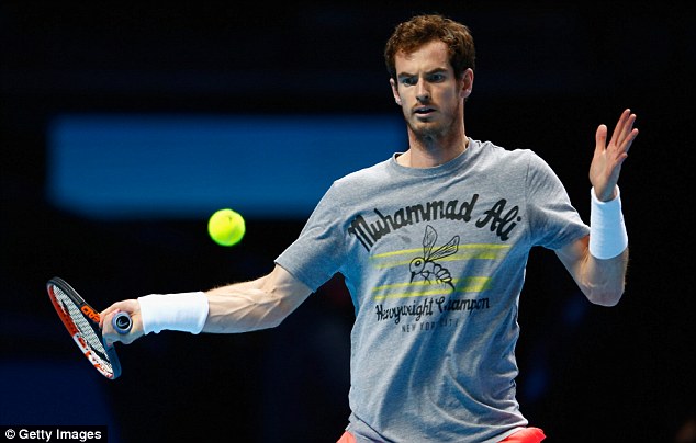 Andy Murray hits a forehand as he takes part in his first practice session at The O2 on Friday evening