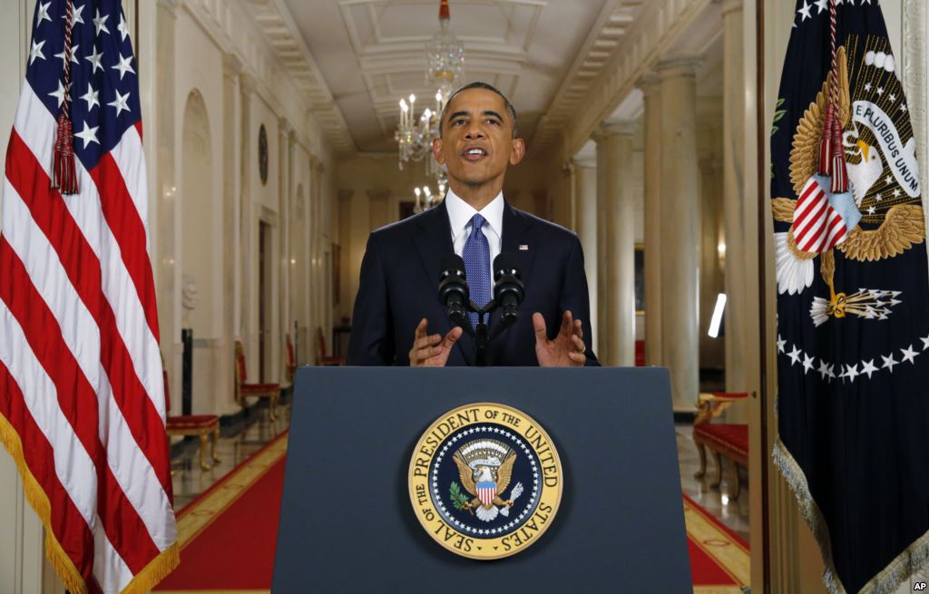 FILE- President Barack Obama announces executive actions on immigration during a nationally televised address from the White House in Washington Nov. 20 2014