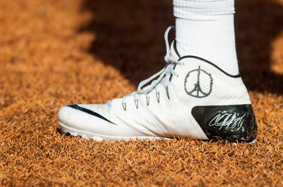 Ohio State quarterback Cardale Jones wears the'Peace for Paris logo on his shoe during the second quarter of an NCAA football game against Illinois Saturday Nov. 14 2015 at Memorial Stadium in Champaign Ill