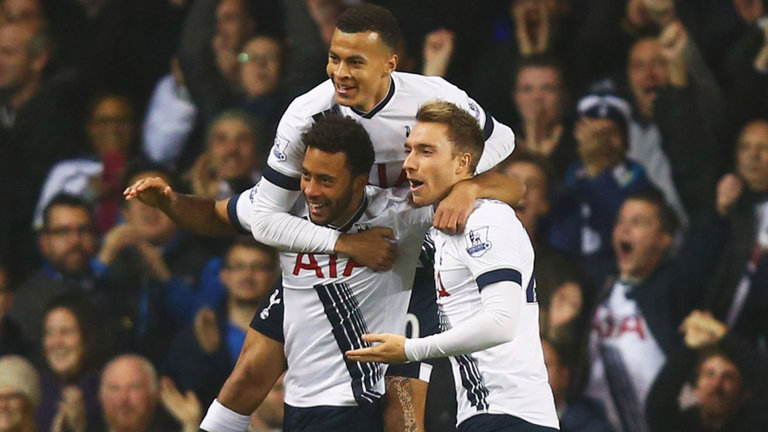 Mousa Dembele celebrates his opening goal against Aston Villa