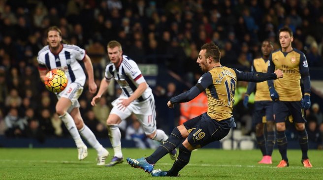 Arsenal midfielder Santi Cazorla slips and hits his penalty over the bar during the English Premier League football match between West Bromwich Albion and Arsenal at The Hawthorns in West Bromwich