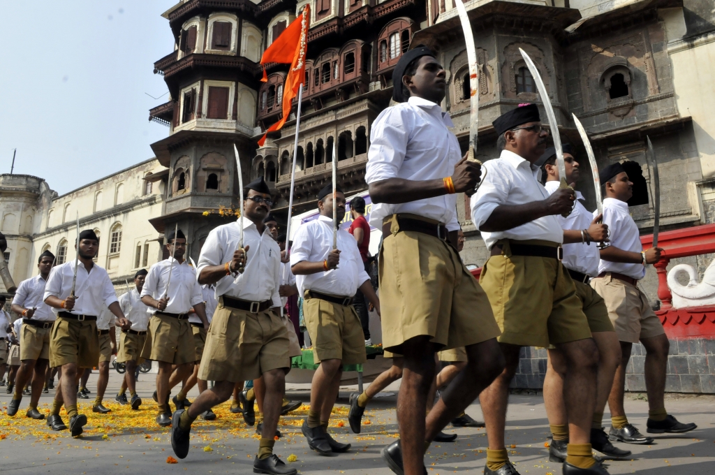 Arun Mondhe—HIndustan Times  Getty Images			RSS volunteers queue up for an annual march at Jehangirabad area in Indore India on Oct. 22 2015