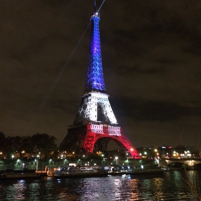 As Paris mourns after the terrorist attacks the Eiffel Tower was lit up Monday evening in France's tricolor