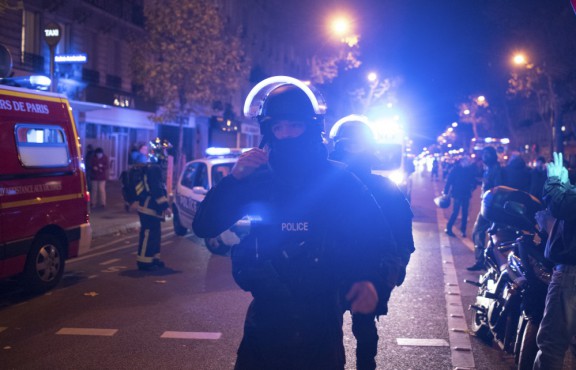 Elite police officers arrive outside the Bataclan theater in Paris