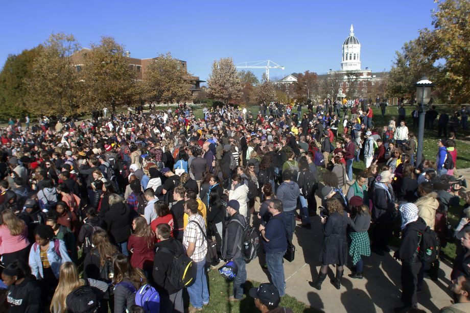 Members of Concerned Student 1950 University of Missouri's Graduate Professional Council faculty and student supporters gather at Mel Carnahan Quadrangle to rally in support of an ongoing protest to get UM System President Tim Wolfe to resign on Monday