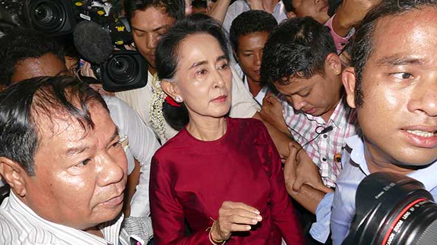 Aung San Suu Kyi center leaves after casting her ballot at a polling station in Burma on November 8. Khin Maung Win  AP