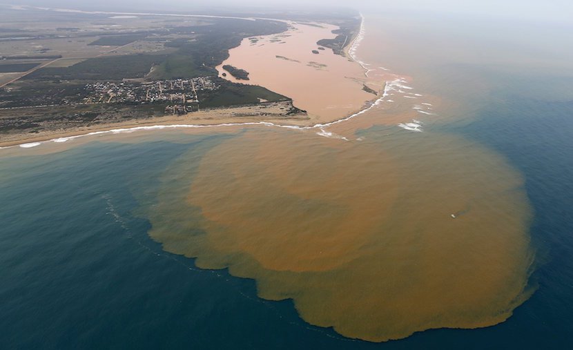 An aerial view of the Rio Doce, which was flooded with mud after a dam owned by Vale SA and BHP Billiton Ltd burst at an area where the river joins the sea on the coast of Espirito Santo in Regencia Village Brazil