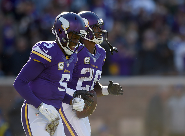 Teddy Bridgewater #5 and Adrian Peterson #28 of the Minnesota Vikings