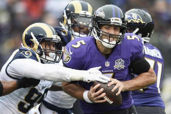 Joe Flacco is sacked by St. Louis Rams defensive tackle Aaron Donald during the first half of an NFL football game in Baltimore Sunday Nov. 22 2015