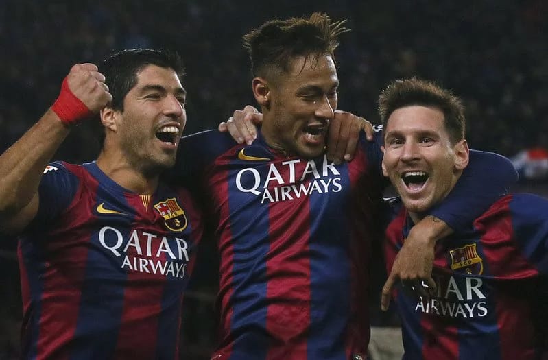 Barcelona's Luis Suarez Neymar and Lionel Messi celebrate a goal against Atletico Madrid during their Spanish First division soccer match at Camp Nou stadium in Barcelona