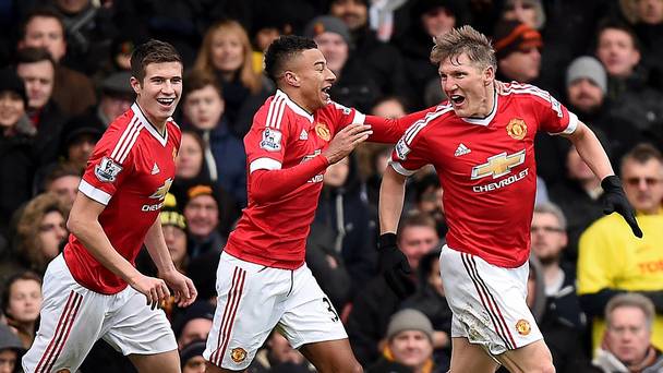 Bastian Schweinsteiger right celebrates with team-mates after a late own goal helped United secure a 2-1 win over Watford