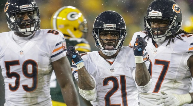 Bears cornerback Tracy Porter celebrates with teammates Christian Jones and Willie Young in the Bears&#039 17-13 win over the Packers on November 26th