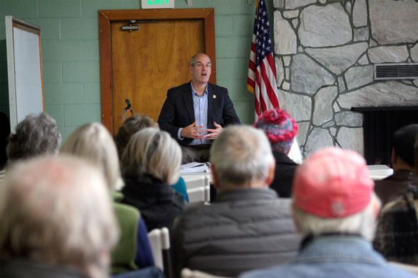 Congressman Rick Larsen fields questions about the Trans Pacific Partnership during a town hall meeting in Clinton on Saturday.- Ben Watanabe  The Record