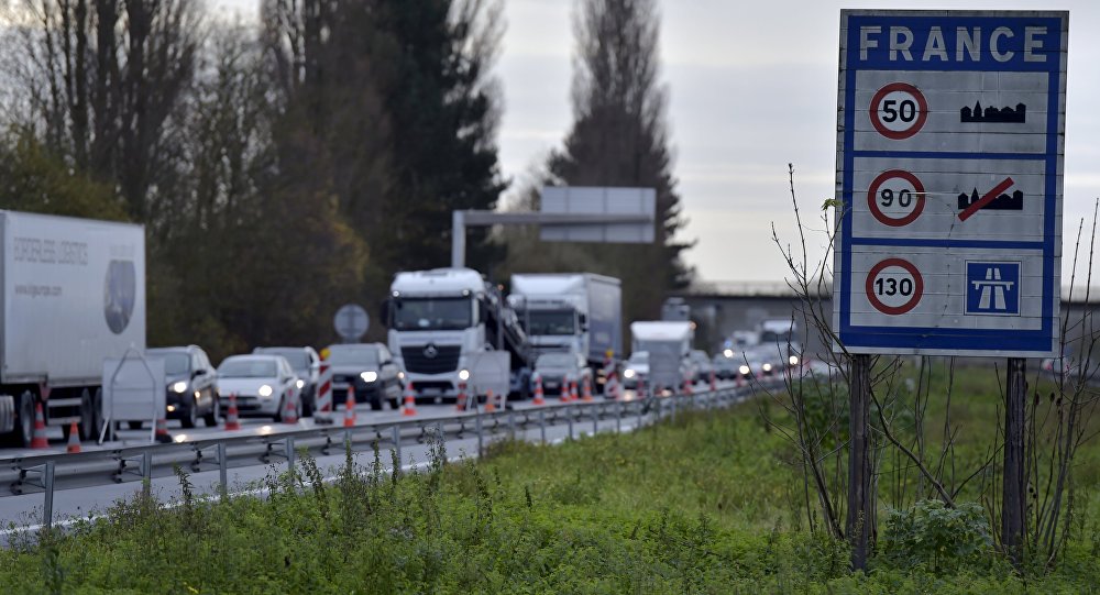 A view shows vehicles queueing in the highway from Paris to Brussels as Belgian and French police officers control the crossing of vehicles on the border between the two countries following the deadly Paris attacks in Crespin France