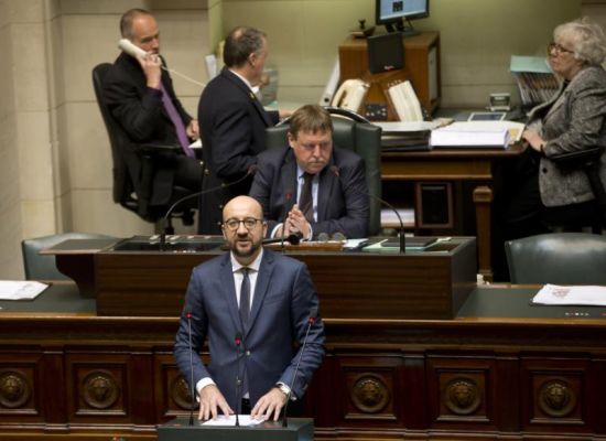 Belgian Prime Minister Charles Michel center addresses Belgian