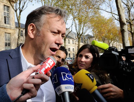 Sylvain Cormier answers questions as he meets the media in front of a police station in Versailles south of Paris France where his client is being questioned Wednesday Nov. 04 2015. France striker Karim Benzema will rem