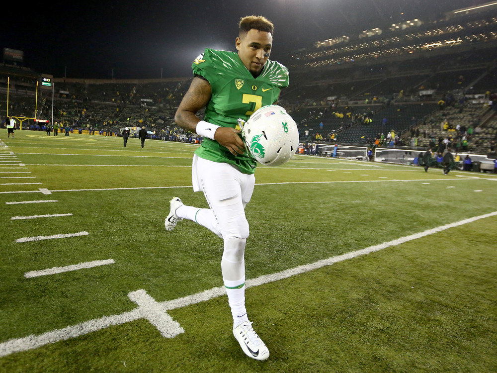 Oregon quarterback Vernon Adams Jr. runs off the field after an NCAA college football game against California Saturday Nov. 7 2015 in Eugene Ore